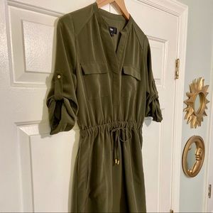 Green tie-waist dress with roll tab sleeves